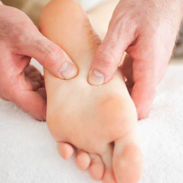 Patient receiving foot treatment