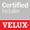 A certified installer logo for velux on a red and gray background.