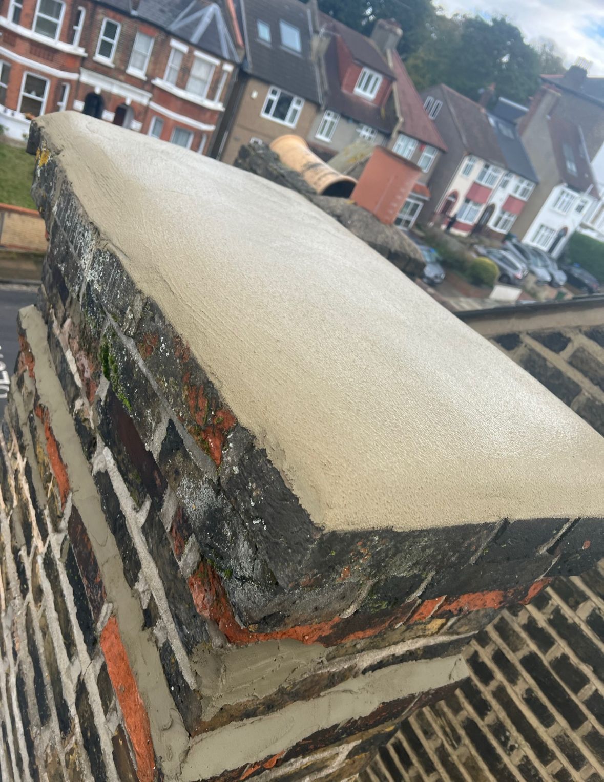 Wimbledon roofer's professional chimney capping and sealing.