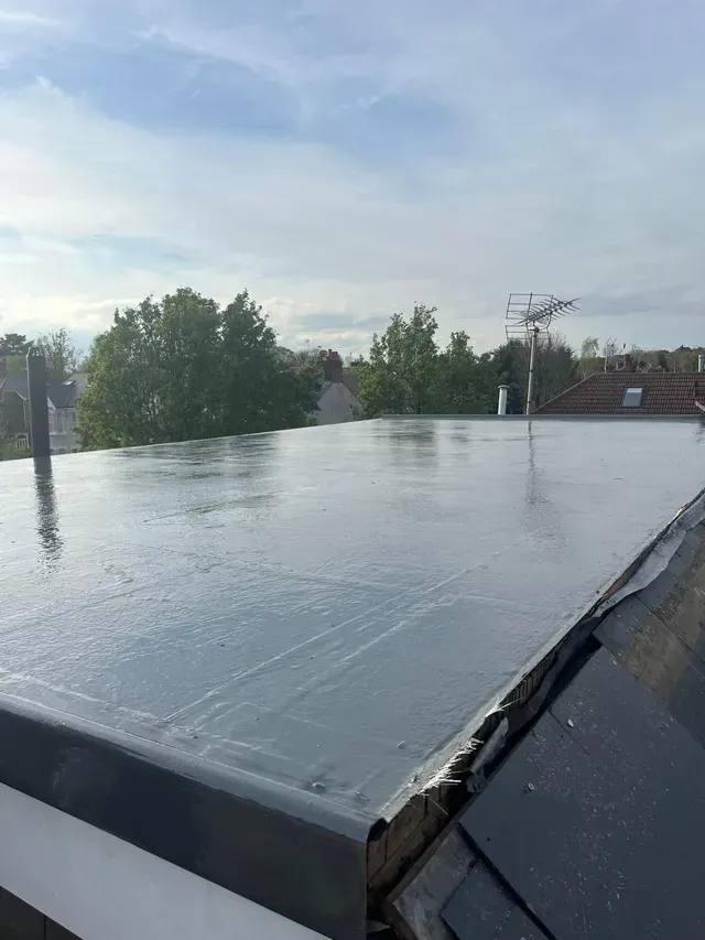 D&R Roofing: Completed flat roof installation showcasing a clean, modern finish in Wimbledon.