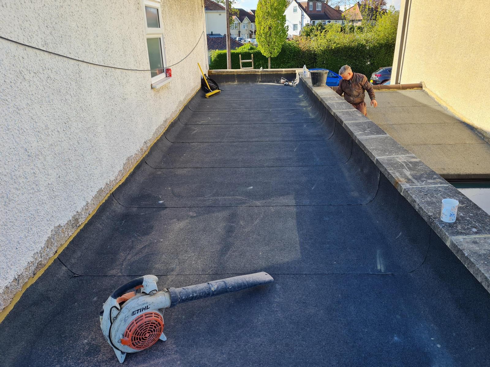 Flat roof installation in progress by D&R Roofing in the Wimbledon area.