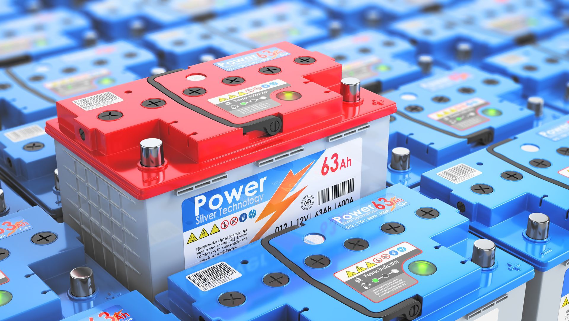 Red and blue battery power packs arranged in rows, with one red unit in the foreground.