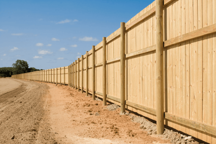 New privacy fence installation outside Wake Forest neighborhood.