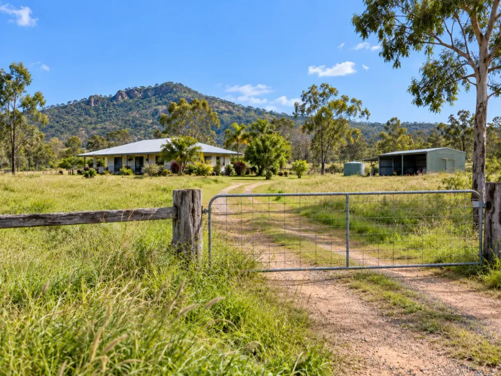 Entry to a rural Townsville property in need of routine slashing.