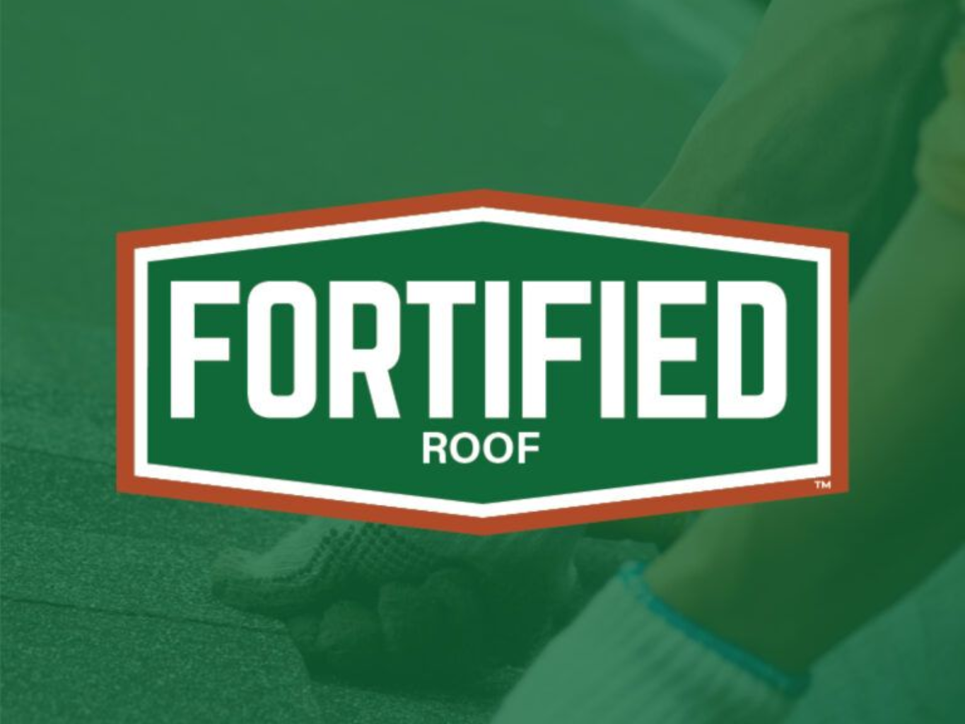 Fortified Roof logo in white and red on a green background