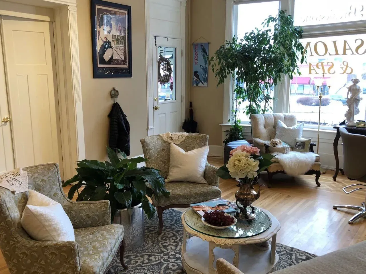 A living room with chairs and a coffee table