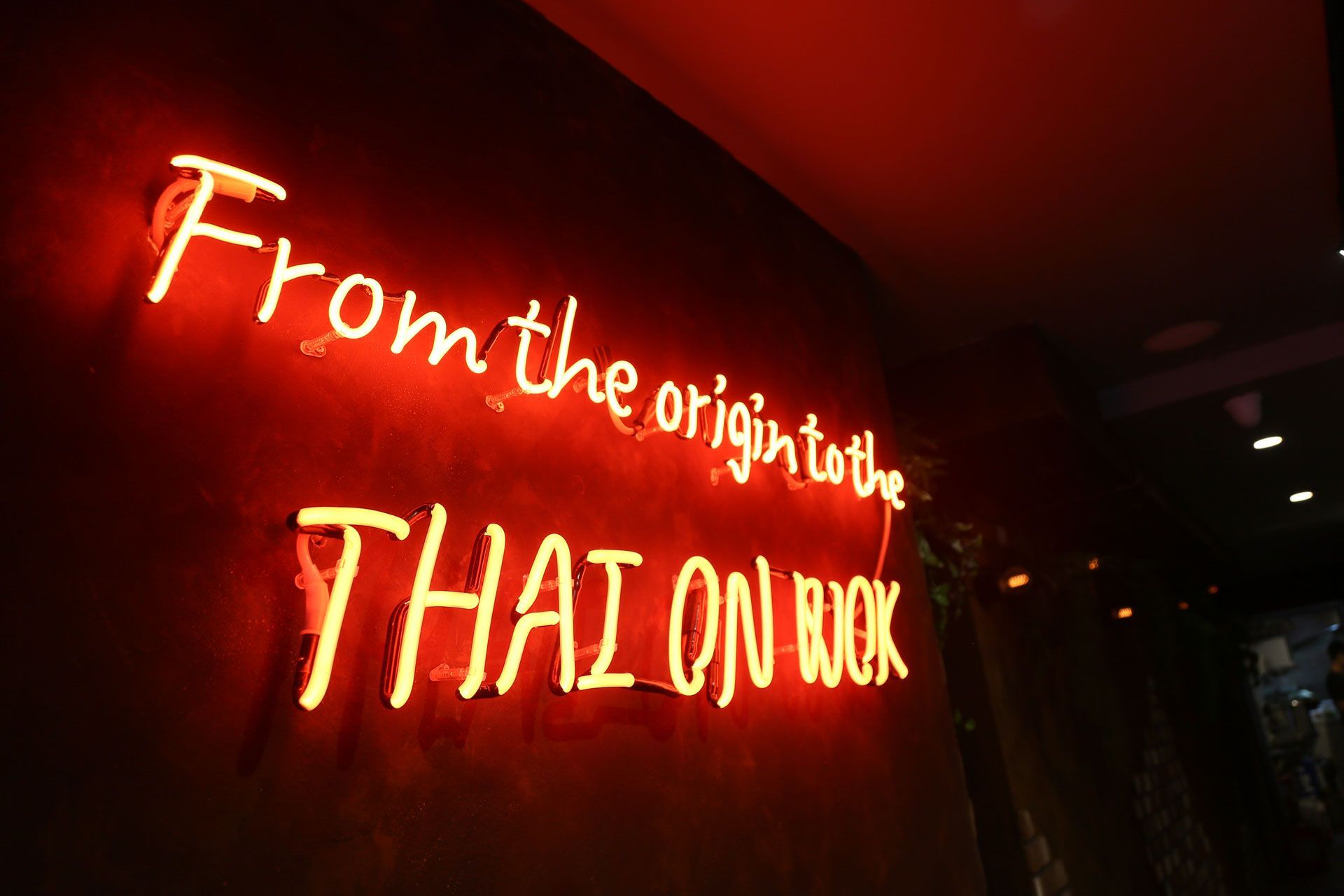 Thai On Wok neon signage at the restaurant in Glebe
