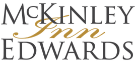 McKinley Edwards Inn logo in black and gold serif script