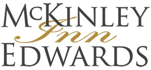 McKinley Jim Edwards logo in black and gold serif text