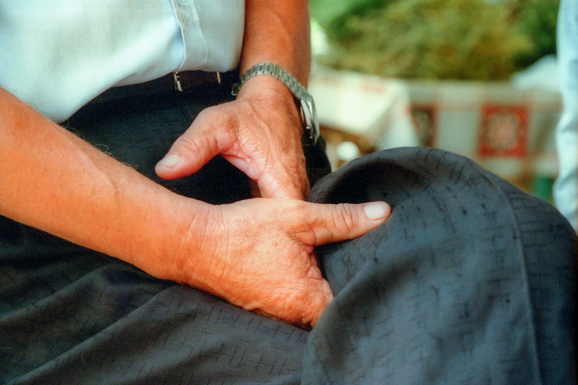 Chiropractor adjusting a man's neck and upper back in a clinic