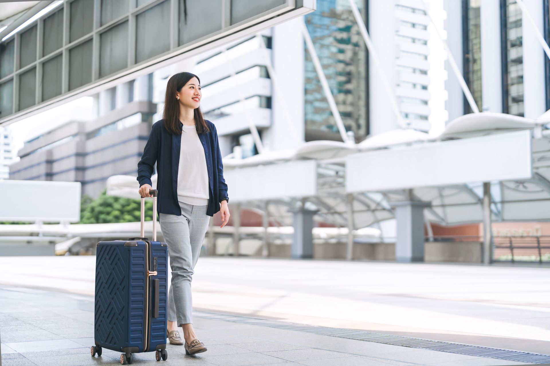 Professional black car service picking up passenger at O’Hare Airport in Chicago, offering reliable