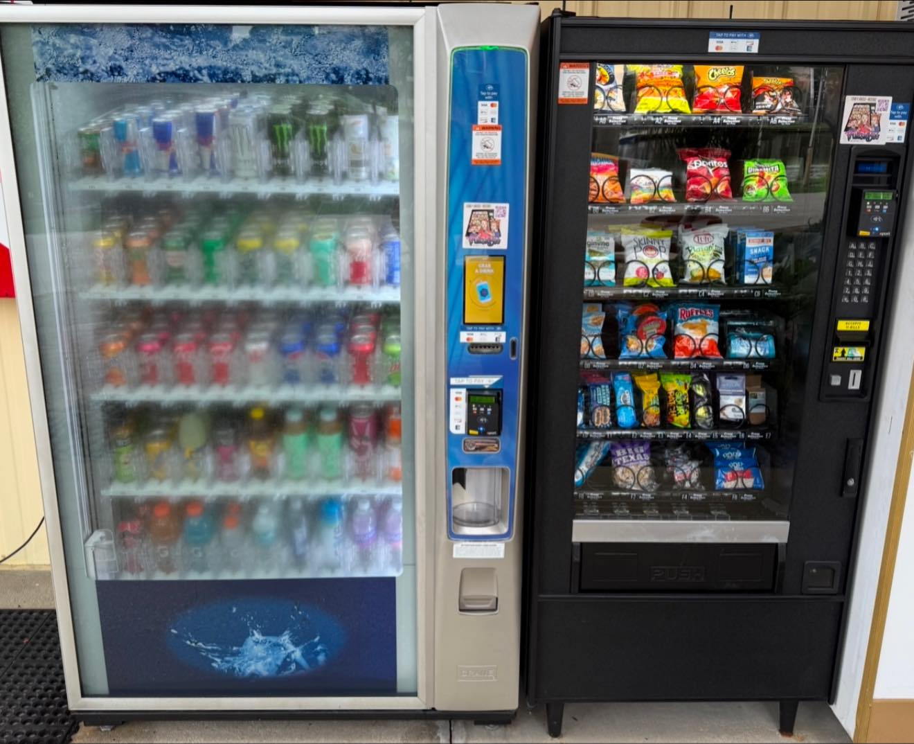 Two side-by-side vending machines, one with glass-front drinks and the other with various snacks.