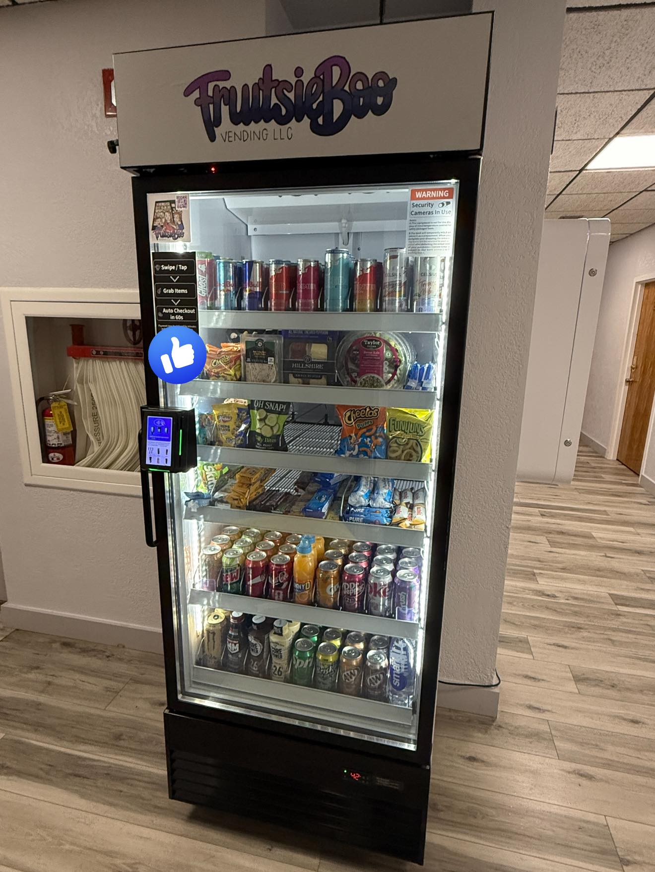 A glass-front vending machine labeled