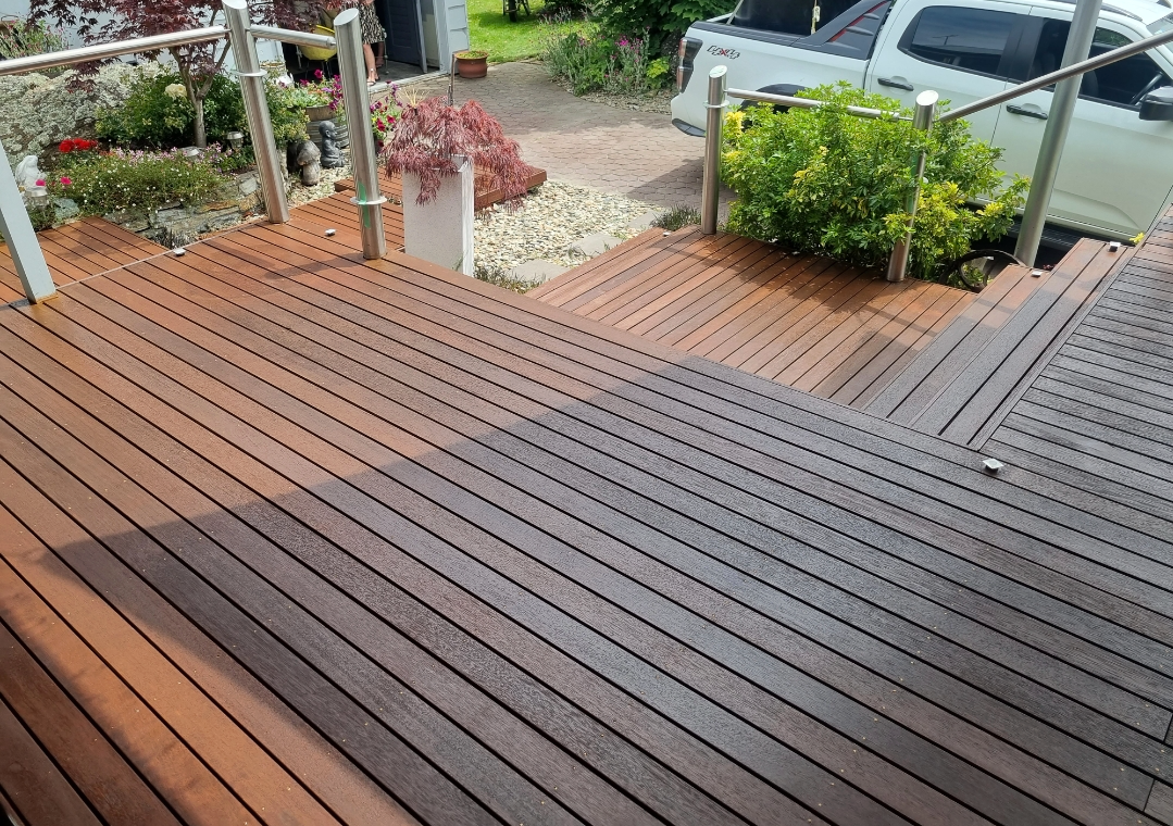 Stained Wooden Deck With Garden — European Floor Sanding In Mount Louisa, QLD