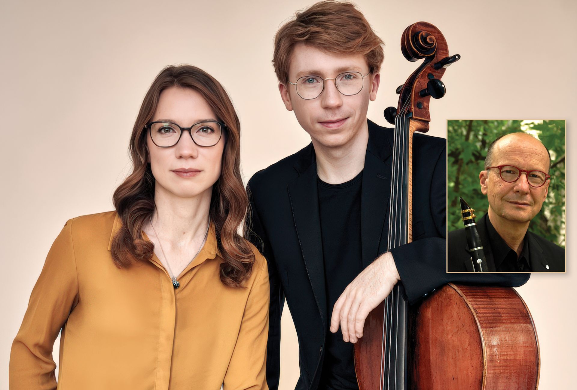 Two musicians, one with a cello, stand next to a portrait of a clarinetist against a neutral background.