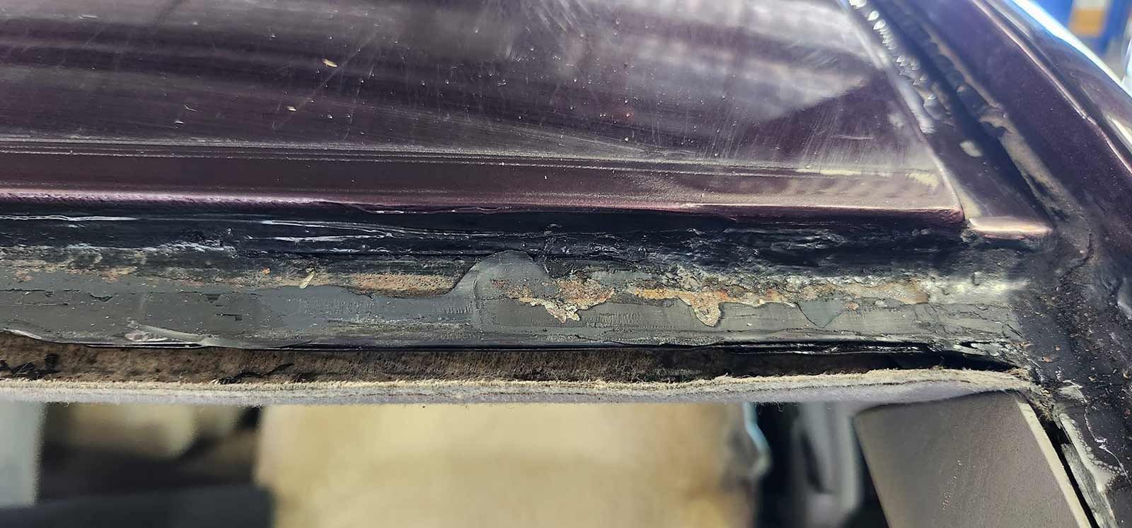 A Close Up of Leaking Window Damage on a Car — FNQ Windscreens in Bungalow, QLD