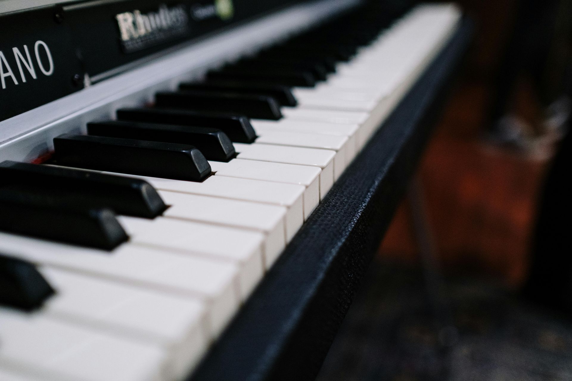 Close-up of black and white piano keys on a digital keyboard