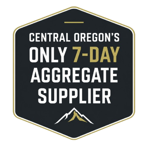 Black hexagon badge reading “Central Oregon’s only 7-day aggregate supplier” with mountain icon