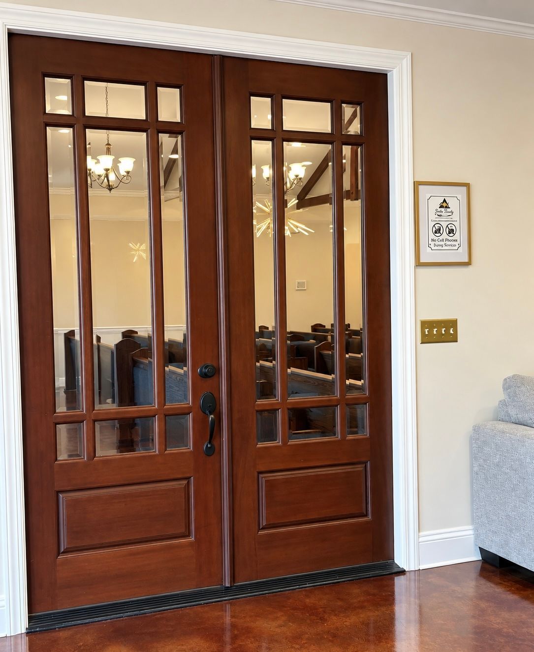 A row of chairs are lined up in a room.