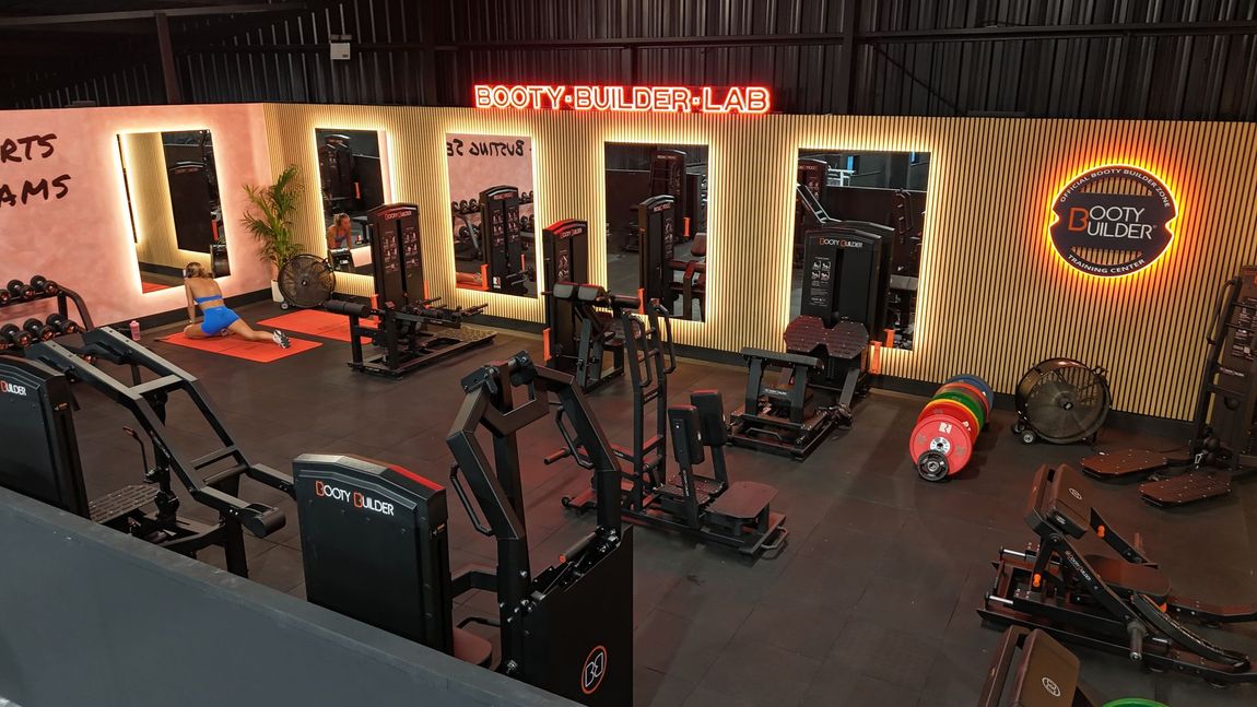 The UK’s biggest dedicated Booty Builder training zone at Team Rees Gym in Caerphilly, featuring specialist glute training machines.