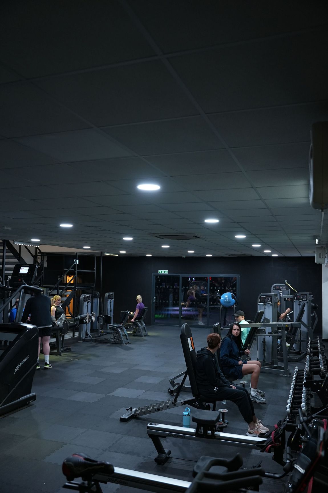 Beginner-friendly selectorised weight-training zone at Team Rees Gym in Caerphilly, featuring easy-to-use resistance machines and lighter dumbbells.