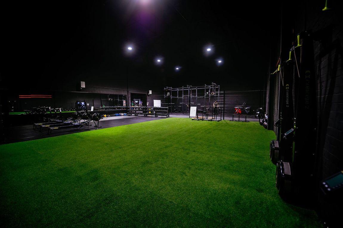 Large HYROX and functional fitness training area at Team Rees Gym in Caerphilly, designed for strength, conditioning and functional workouts.
