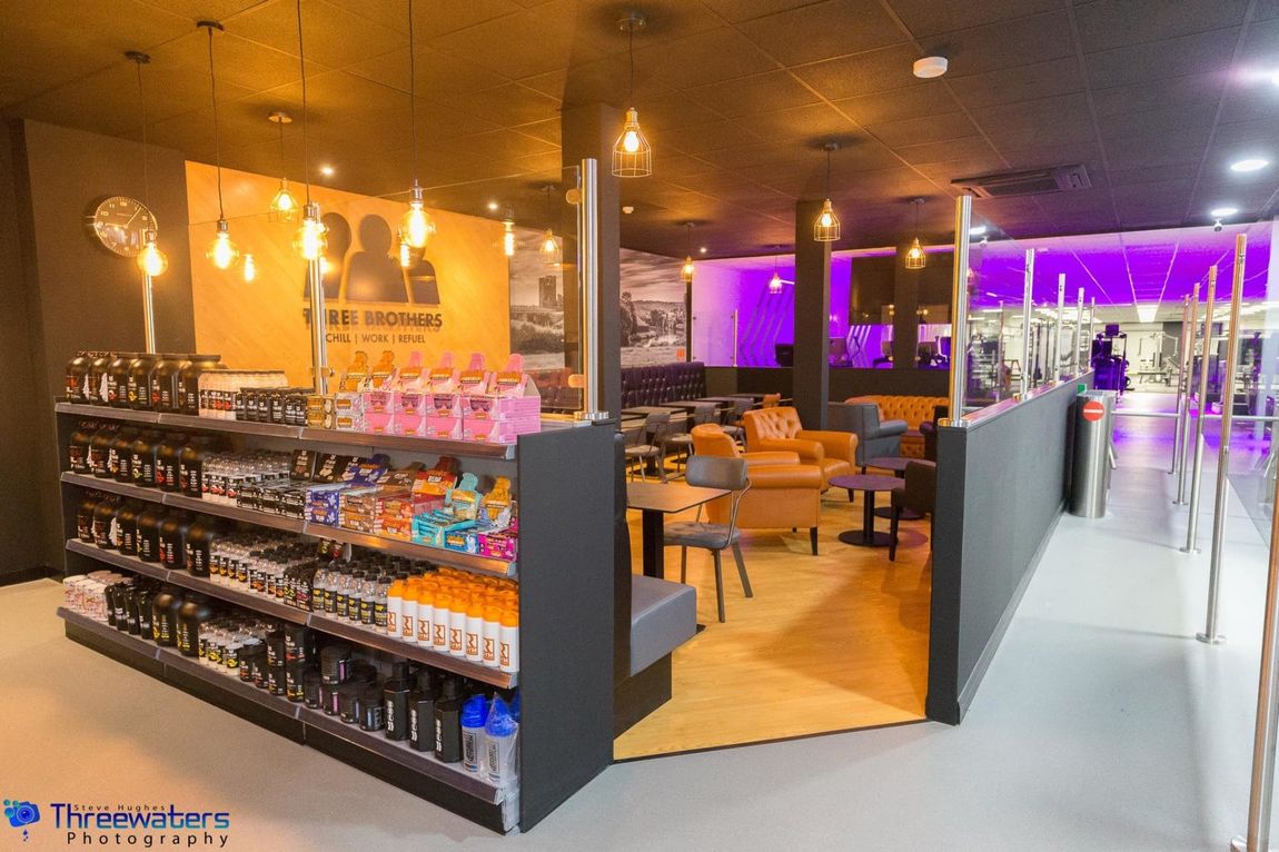 Coffee shop inside Team Rees Gym in Caerphilly, serving fresh coffee, high-protein meals, wraps, overnight oats and snacks.
