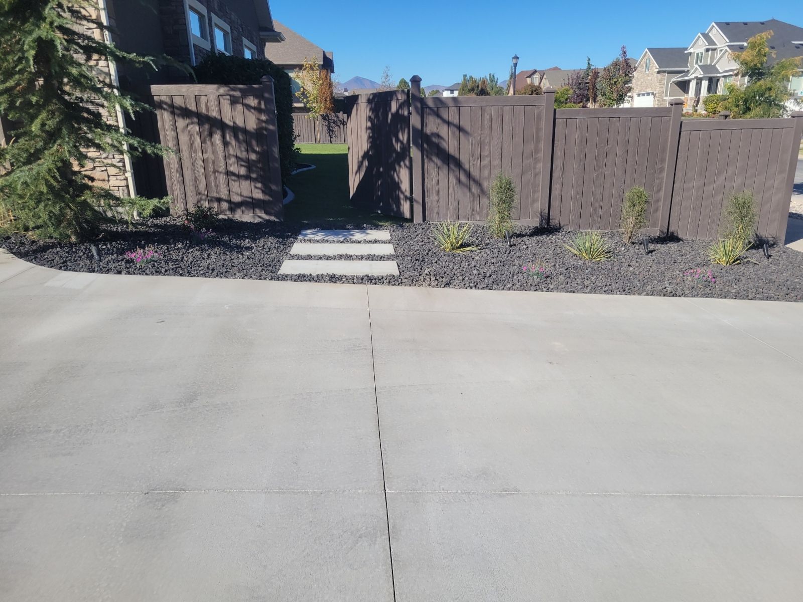 Wooden Fence and Driveway - South Jordan, UT – MD Property Maintenance & Landscaping
