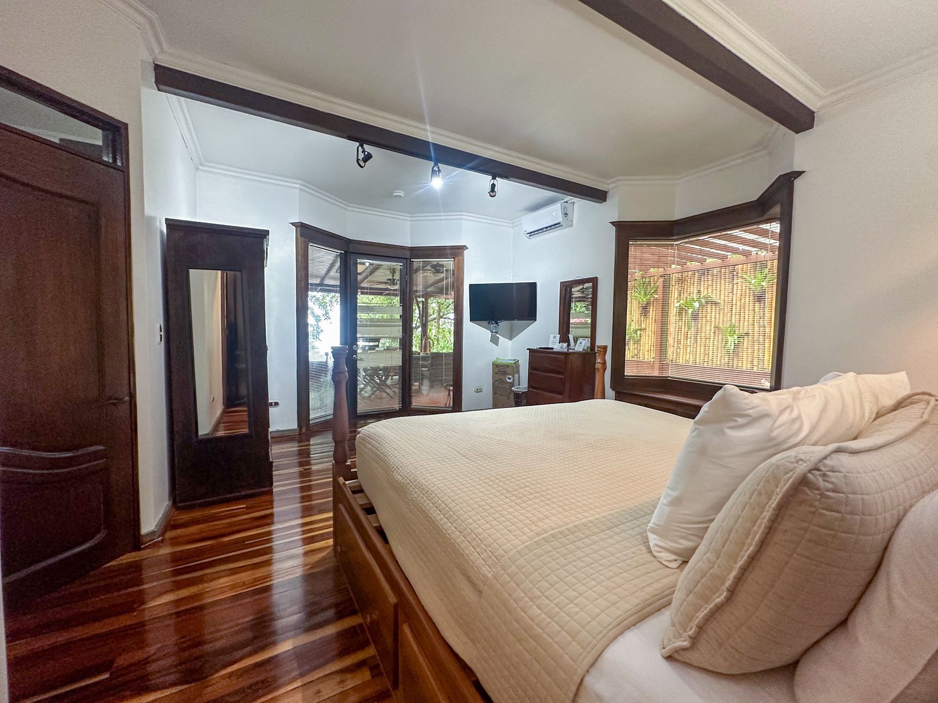 There is a large bed in the middle of the room.
