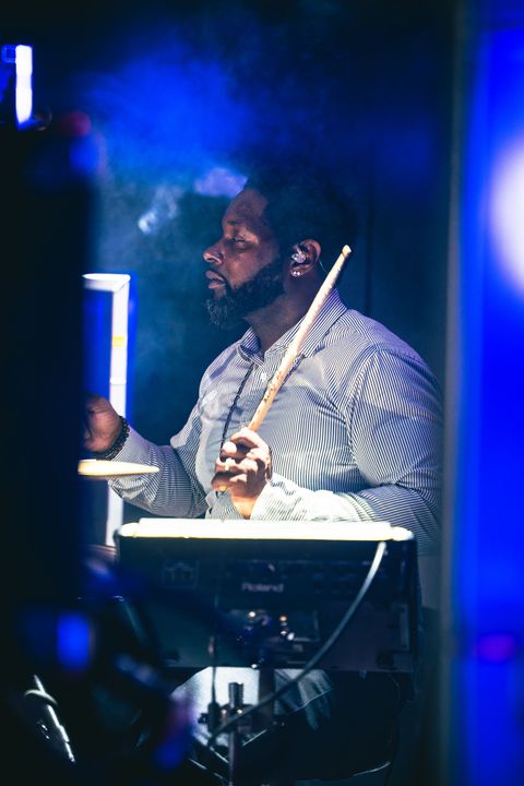 An elegant live music event with a full band and guests celebrating