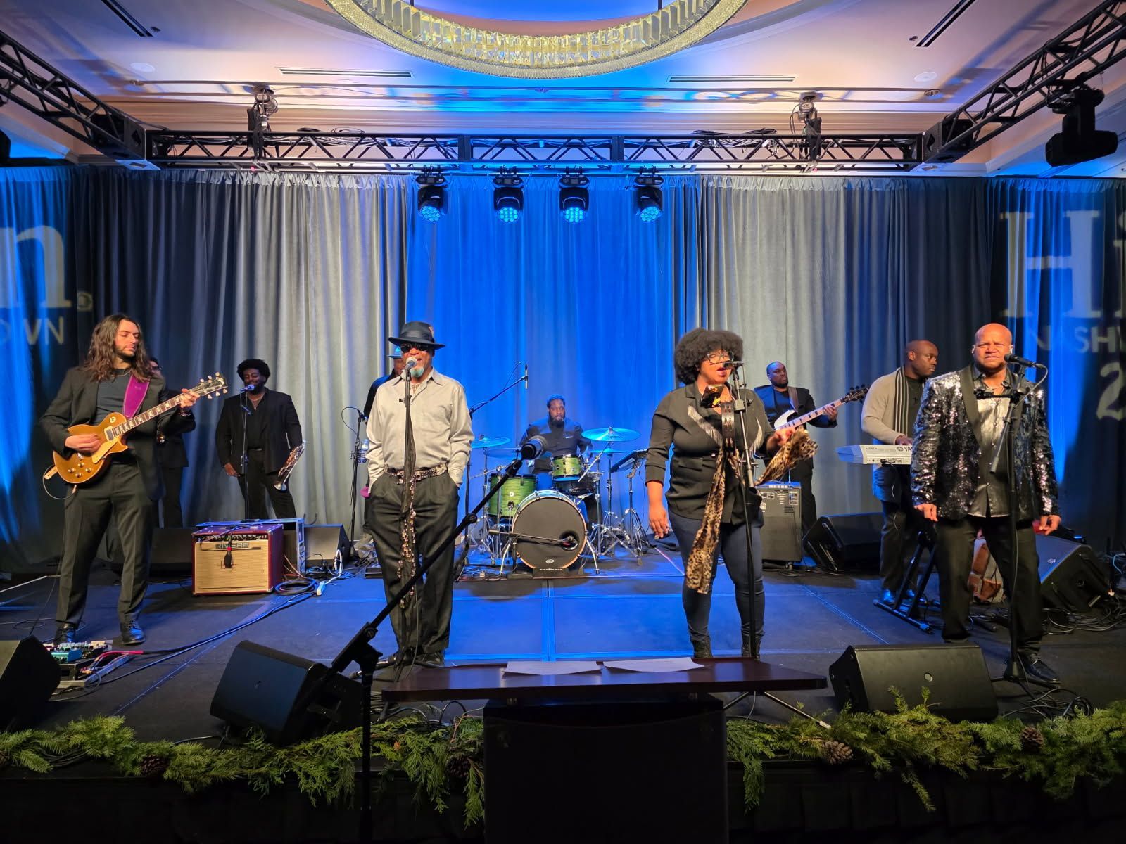 Tented outdoor event with live band production