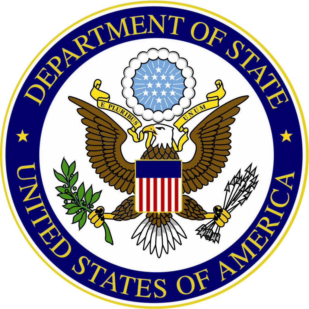 U.S. Department of State seal with an eagle, shield, stars, olive branch, and arrows on a blue background