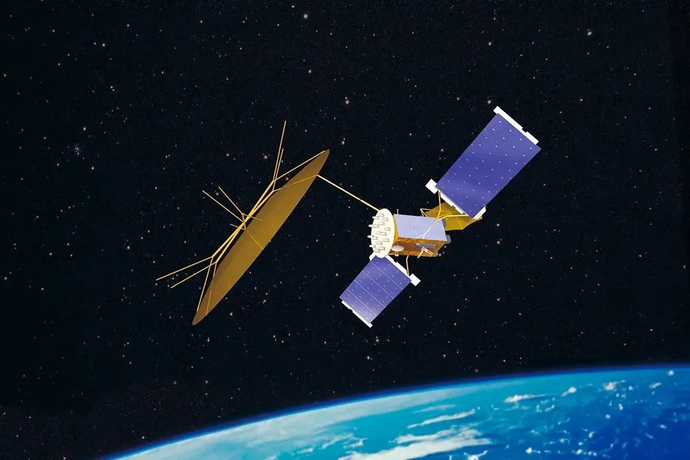 Satellite in orbit over Earth, with solar panels and a large gold antenna, against a starry background.
