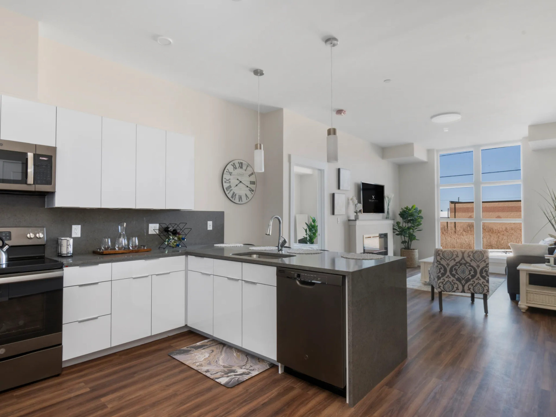 Newburyport Crossing modern kitchen oversees living room,