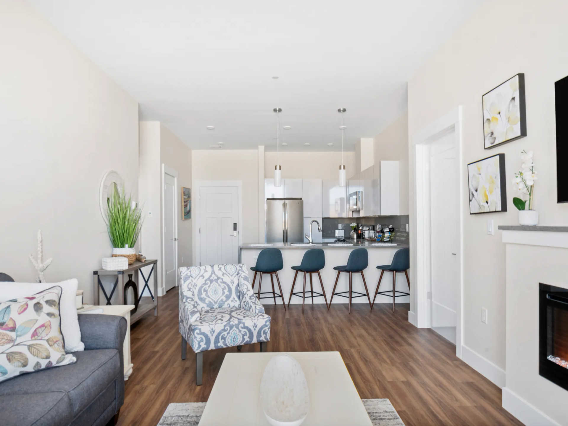 Living Room with Kitchen View at Newburyport Crossing.