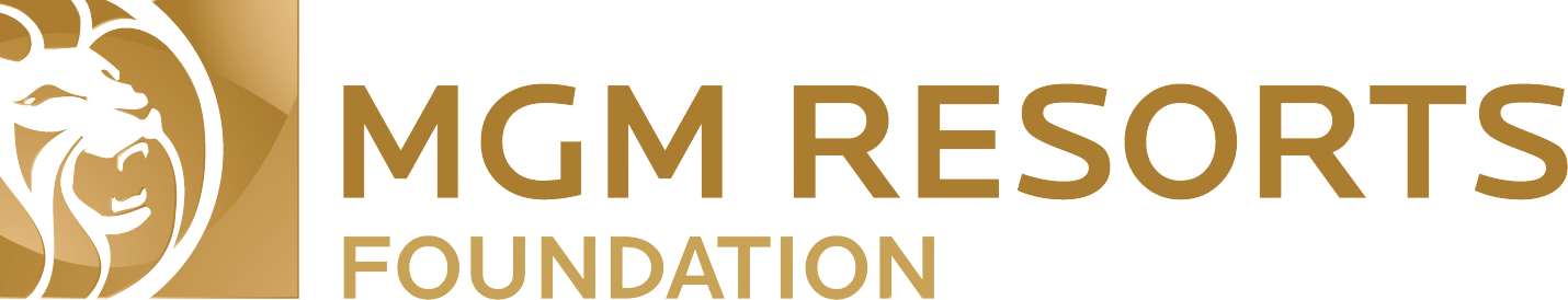 The logo for the mgm resorts foundation has a lion on it.