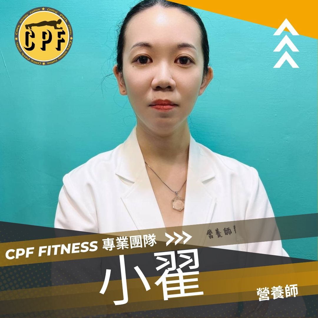 A woman wearing a white jacket with chinese writing on it