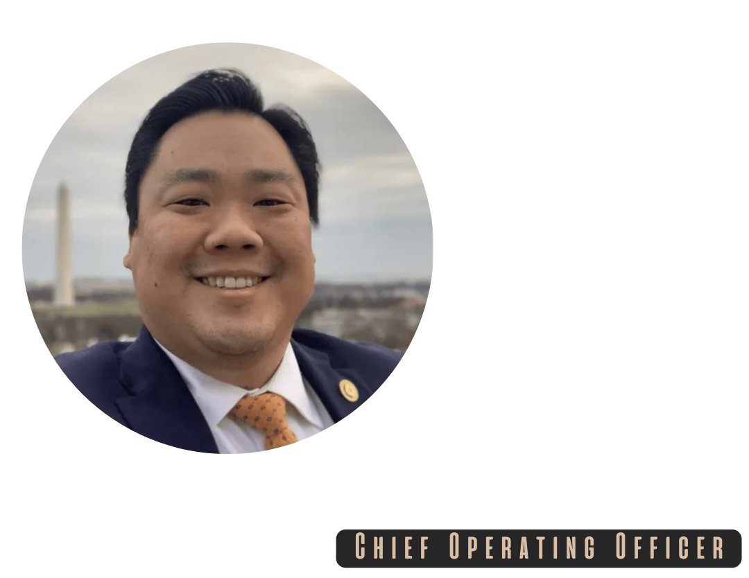 A man in a suit and tie is smiling in a circle with the words chief operating officer below him
