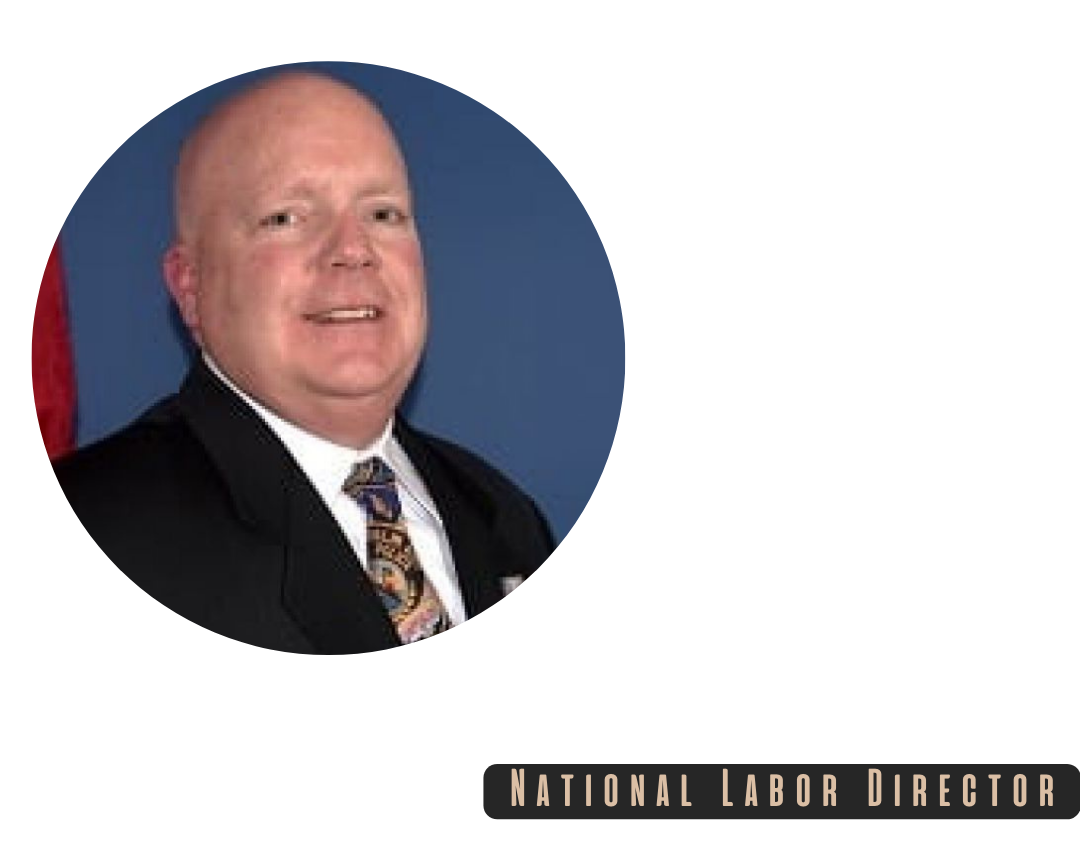 A man in a suit and tie is the national labor director