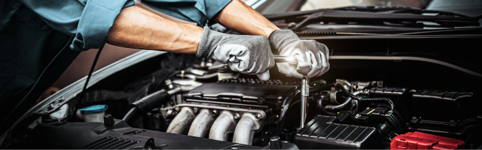 Man Performing Car Repair | JAK'S TIRE & AUTO