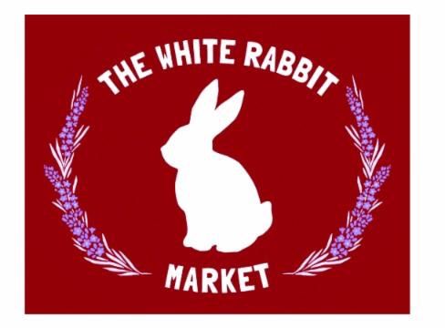 White rabbit logo with “The White Rabbit Market” on a red background, framed by lavender sprigs