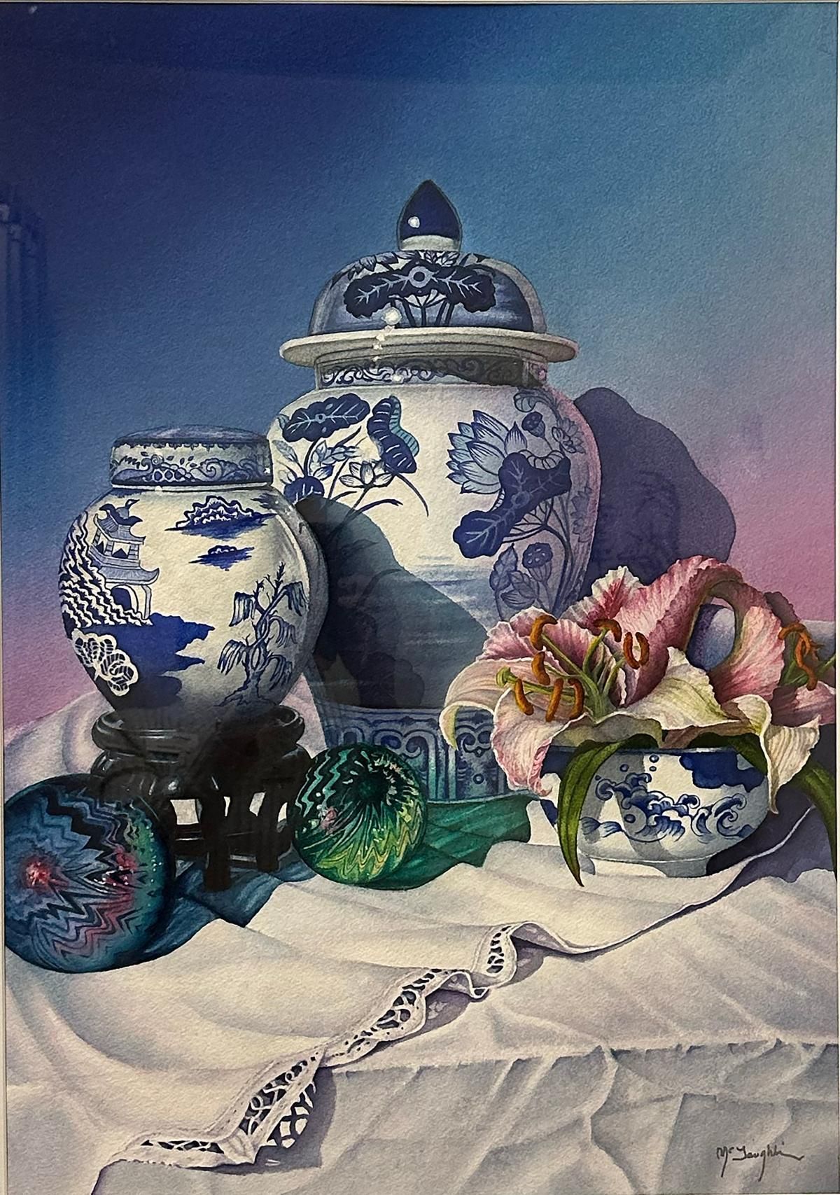 Blue-and-white porcelain jars and floral fruit on a draped table against a blue background