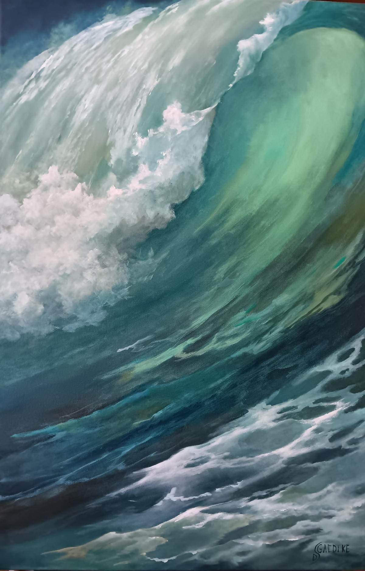 Turquoise ocean wave curling with white foam and spray