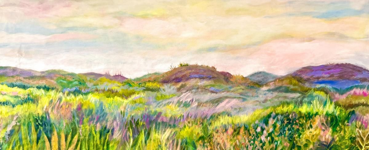 Colorful grassy meadow with rolling hills under a pastel sunrise sky