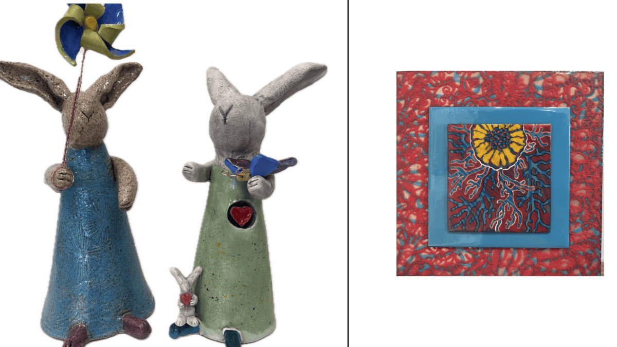 Two whimsical rabbit sculptures and a colorful quilted square wall hanging with a sun motif