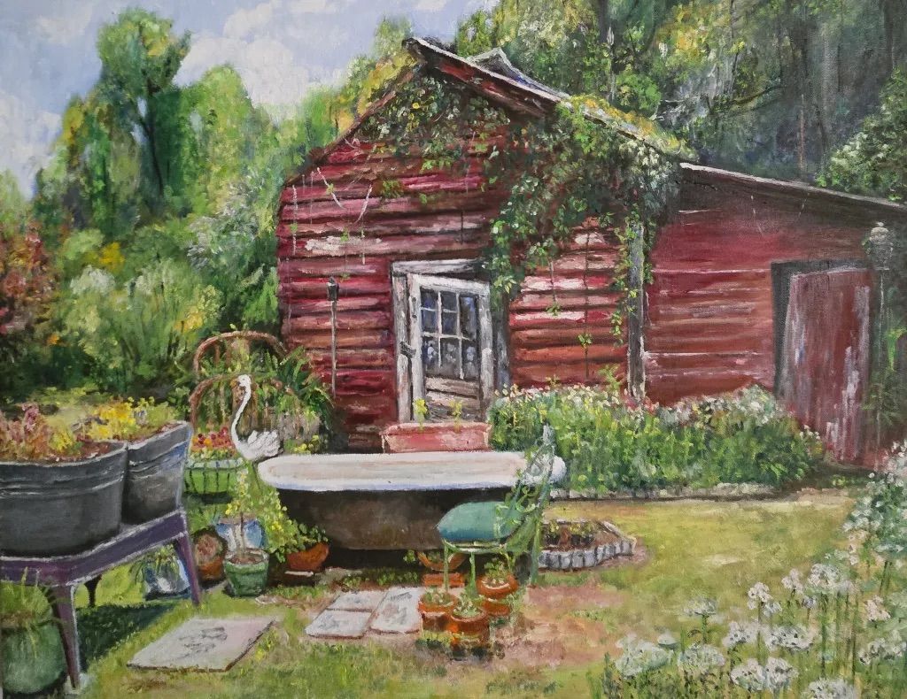 Red cottage garden with potted plants, a birdbath, and lush greenery in soft light
