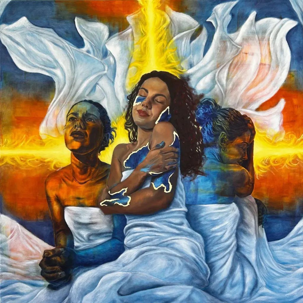 Three seated figures in flowing blue and white fabric against a fiery orange background with angelic wings