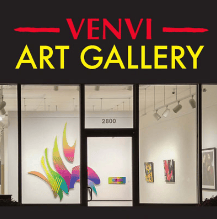 Venvi Art Gallery storefront with large black sign, colorful artwork, and lit interior displays