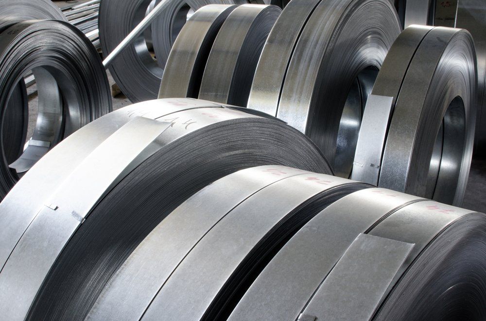 A Bunch of Metal Rolls Are Stacked on Top of Each Other — North Coast Steel in Crescent Head, NSW