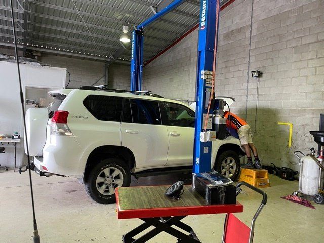 Mechanic Repairing the Car's Engine — Dyna Automotive in Paget, QLD